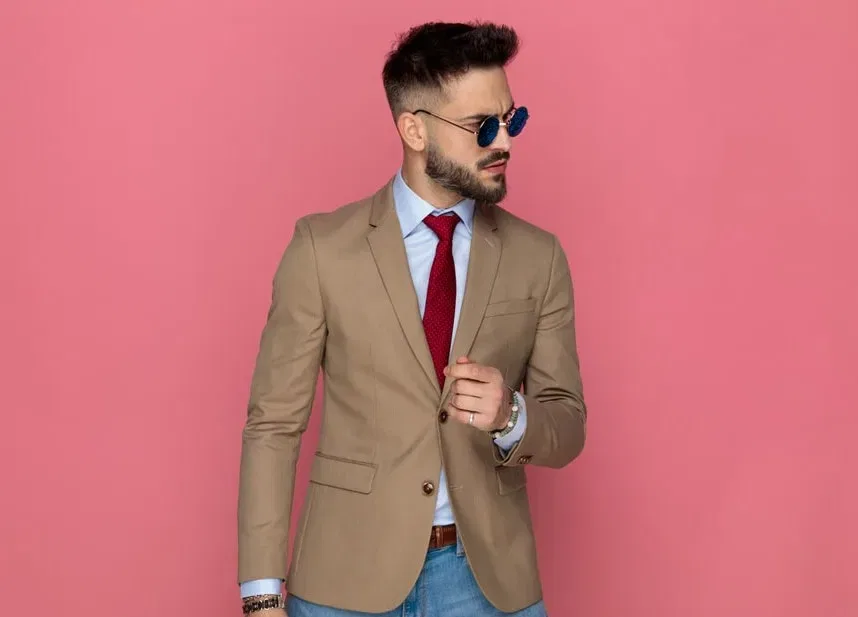 dress shirt with red tie and jeans