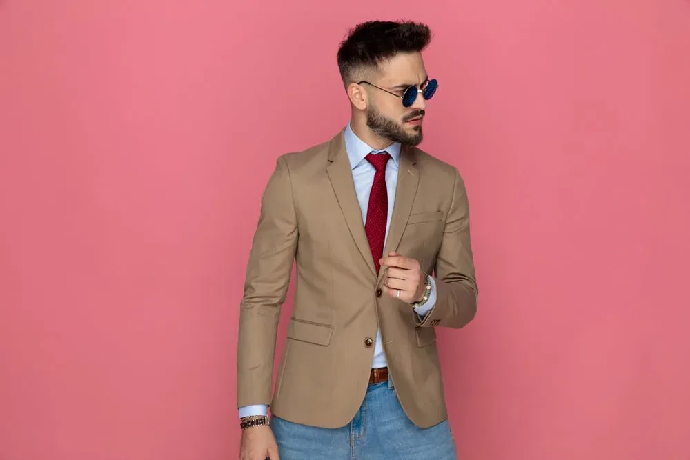 dress shirt with red tie and jeans
