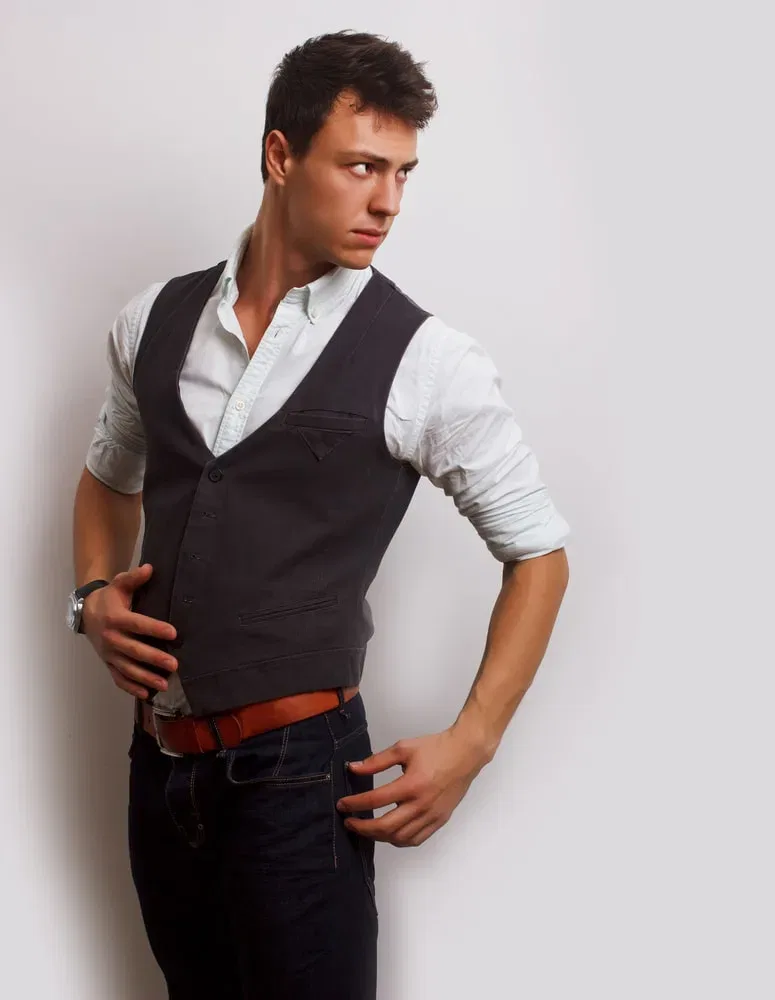vest and jeans