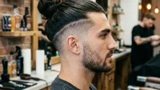 Man bun with undercut fade hairstyle side profile