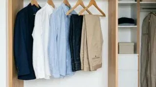 Organized men's capsule wardrobe with essential pieces