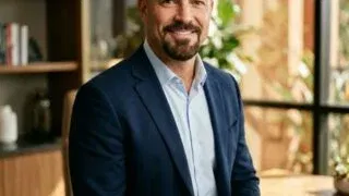 Confident bald man with well-groomed goatee